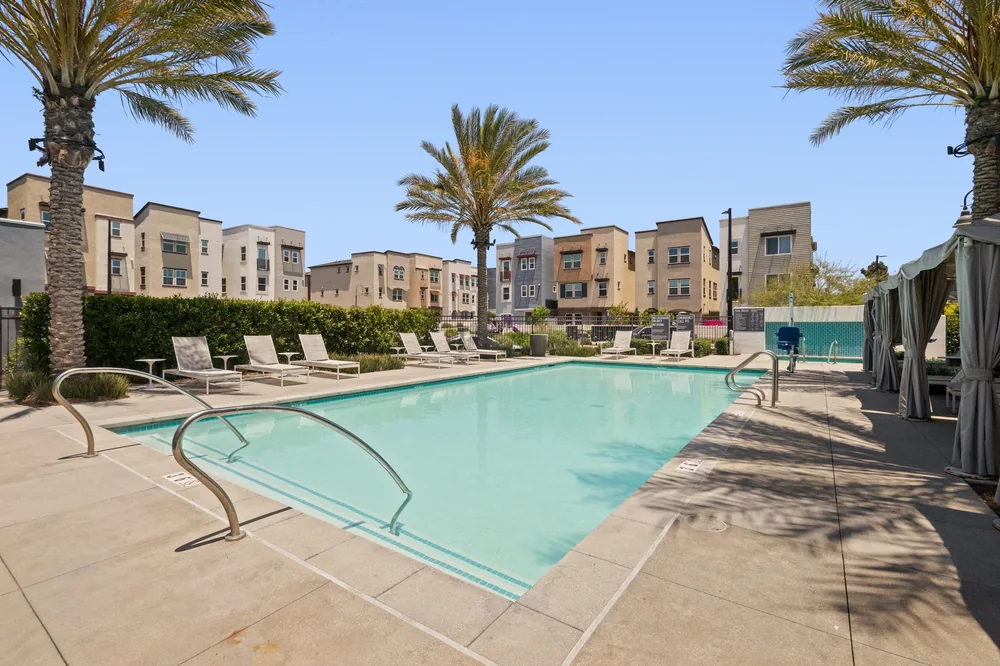 Grace Park community resort-style pool with cabanas and lounge chairs